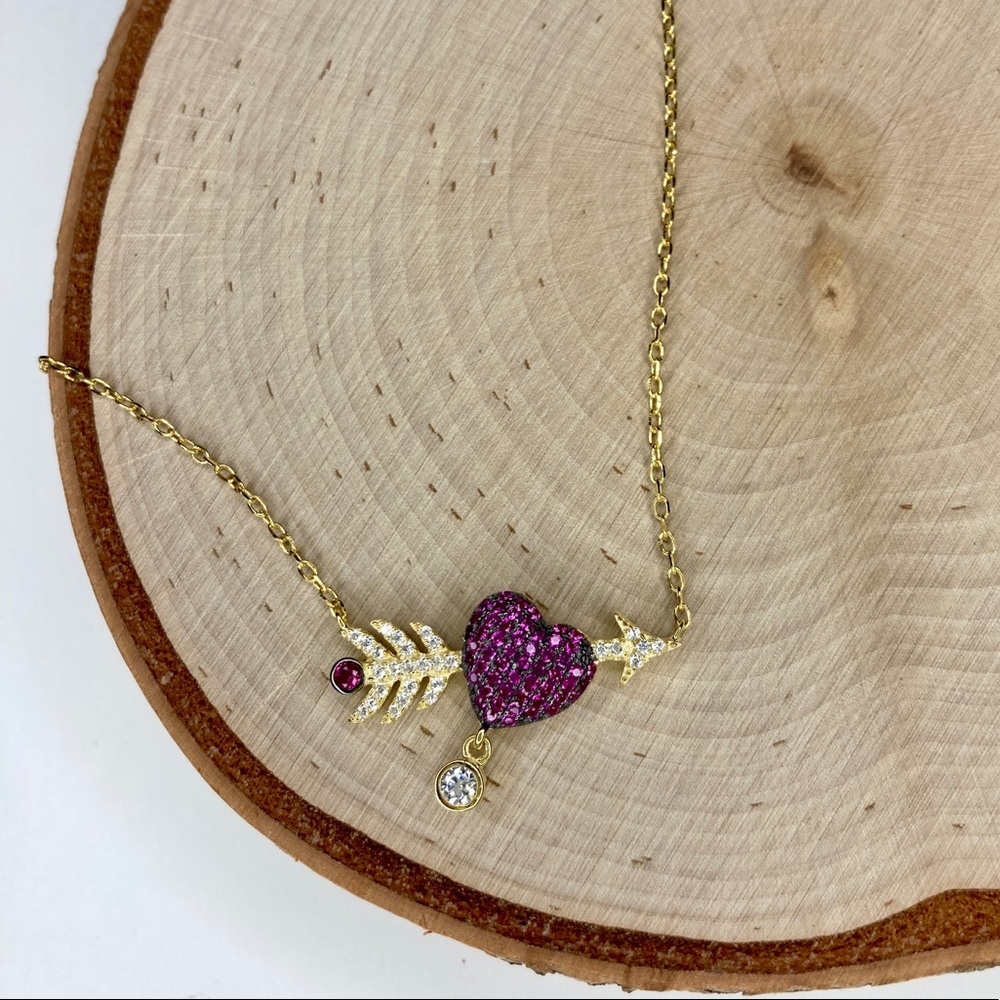 Sparkling ruby cz heart & gold arrow necklace